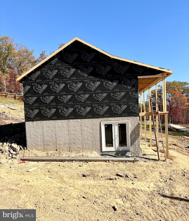 view of outdoor structure with french doors