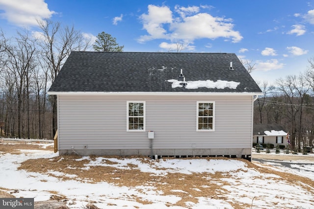 view of snow covered property