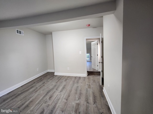 unfurnished room with light hardwood / wood-style flooring