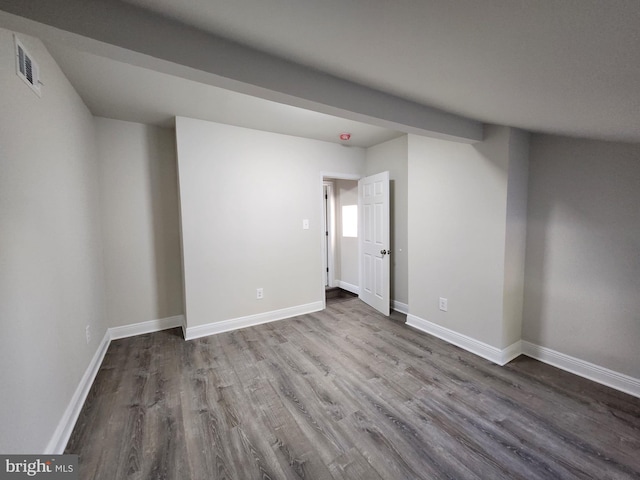 unfurnished room with hardwood / wood-style floors