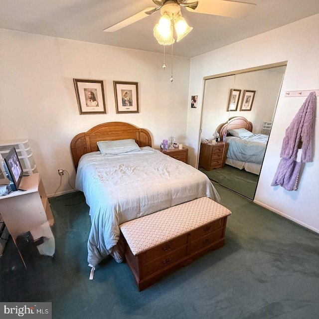 carpeted bedroom featuring ceiling fan and a closet