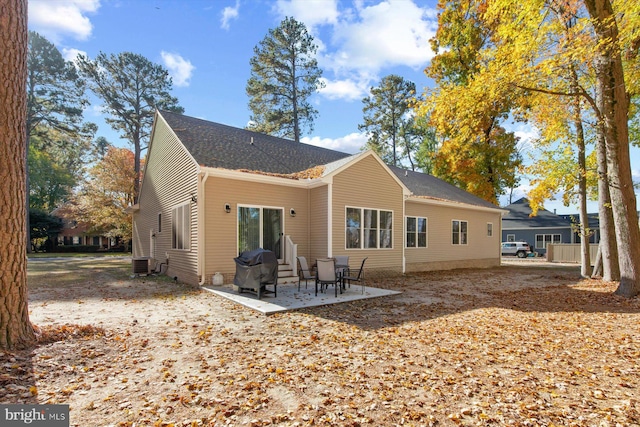 back of house featuring a patio area and central AC