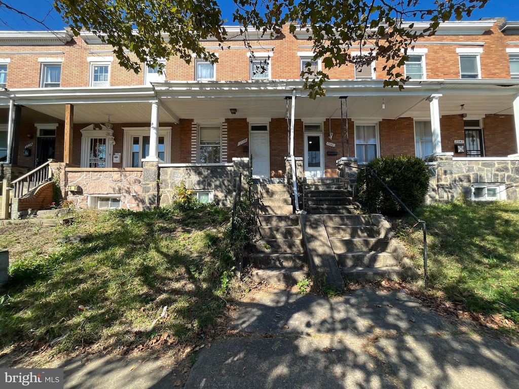 view of property with covered porch