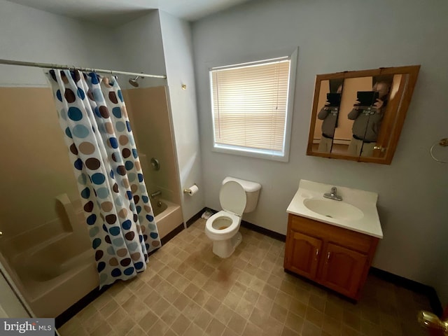 full bathroom featuring vanity, toilet, and shower / bath combination with curtain