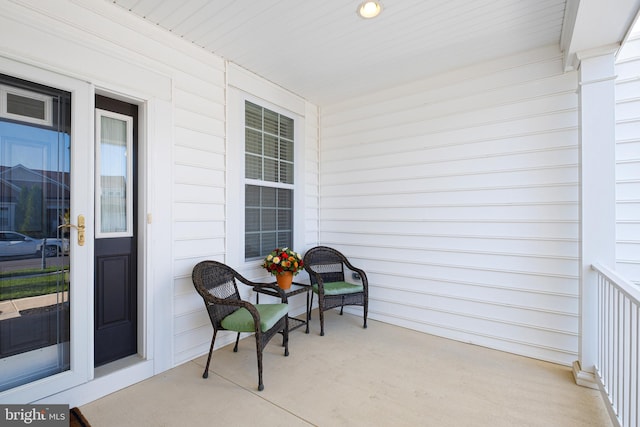 balcony featuring covered porch