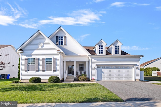 view of front of home featuring covered porch and a front yard