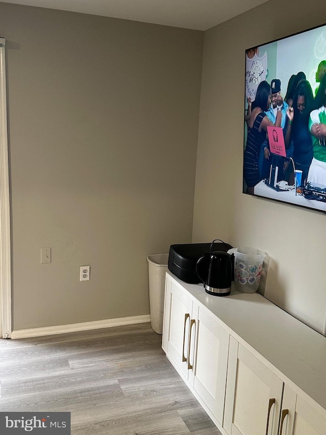 bathroom featuring vanity and wood-type flooring