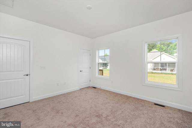 view of carpeted spare room