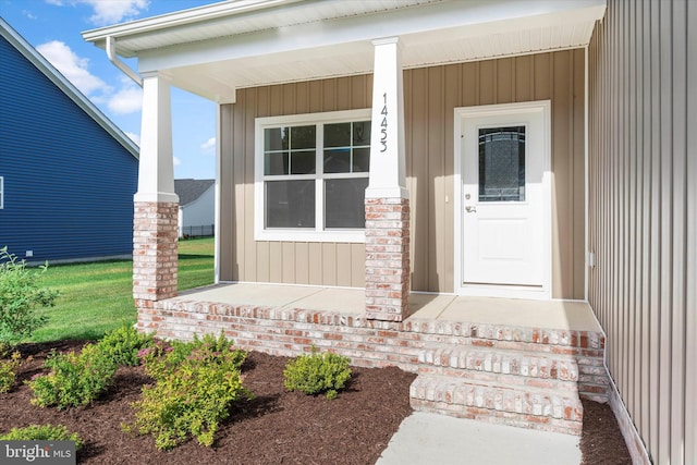 property entrance featuring covered porch