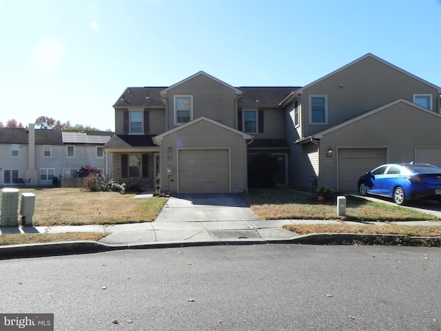 front of property featuring a garage