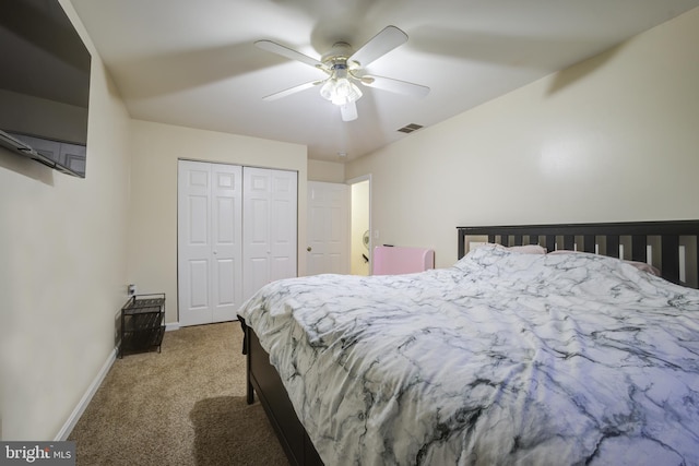 bedroom with a closet, ceiling fan, and carpet