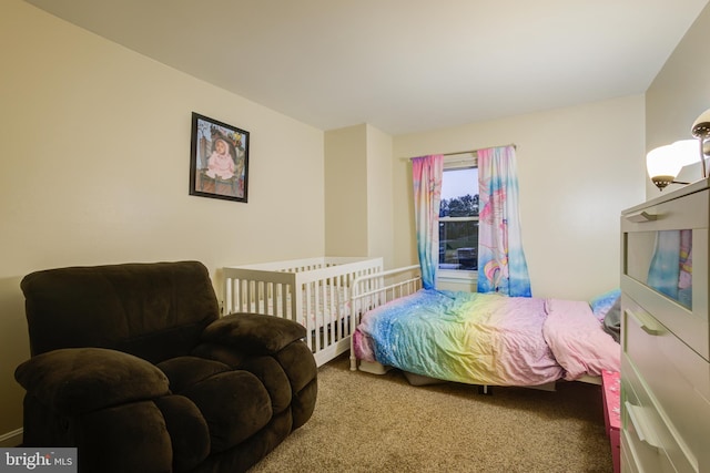 bedroom featuring carpet