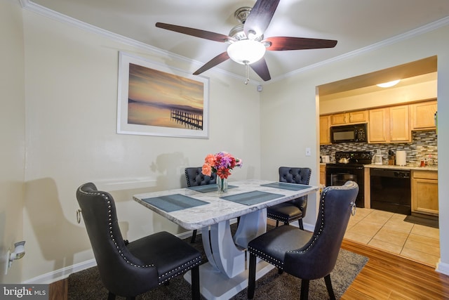 dining area featuring ceiling fan, crown molding, and light wood-type flooring