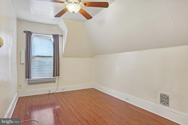 bonus room featuring vaulted ceiling, wood-type flooring, and ceiling fan