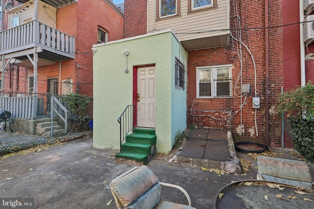 doorway to property with a balcony