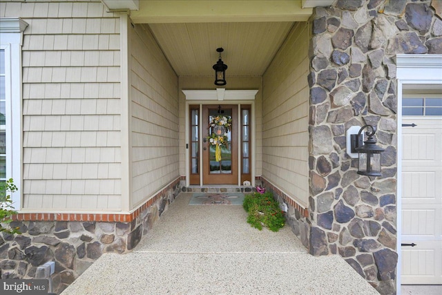 property entrance with a porch