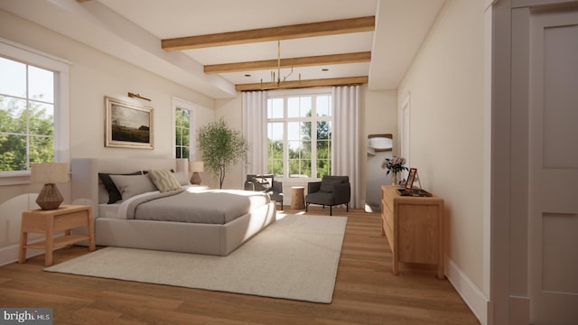 bedroom with beamed ceiling and hardwood / wood-style floors