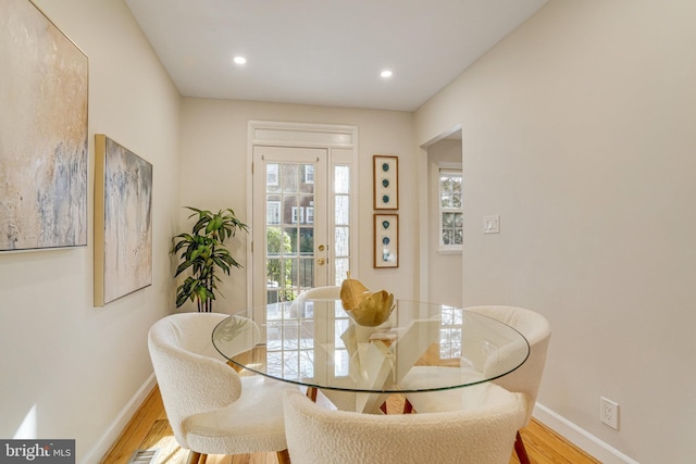 dining area featuring wood-type flooring