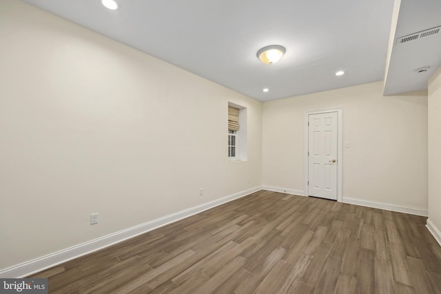 unfurnished room featuring wood-type flooring