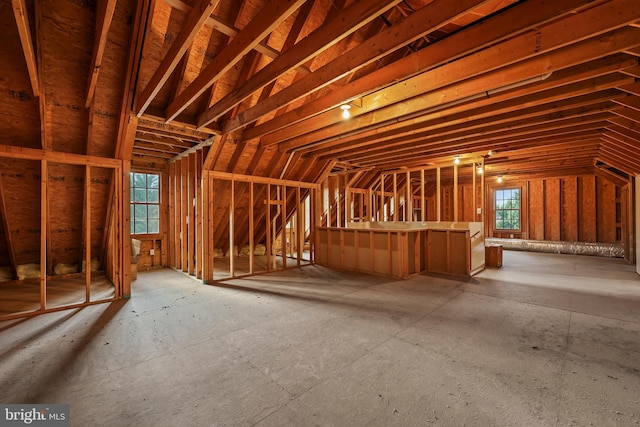 misc room featuring lofted ceiling and a wealth of natural light