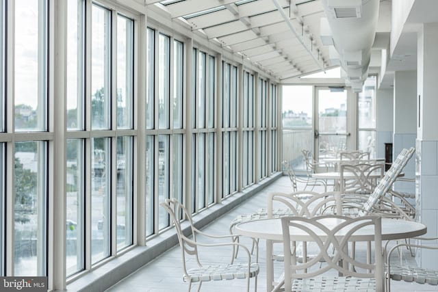 sunroom / solarium with rail lighting