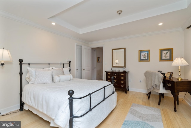 bedroom featuring ornamental molding and wood-type flooring