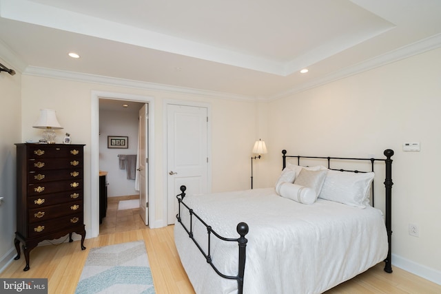 1701 Locust St Unit 1505, Philadelphia, PA 19103 - bedroom featuring ornamental molding, light wood-style flooring, and baseboards
