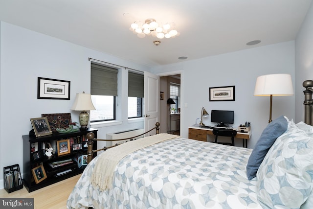 bedroom featuring light hardwood / wood-style flooring