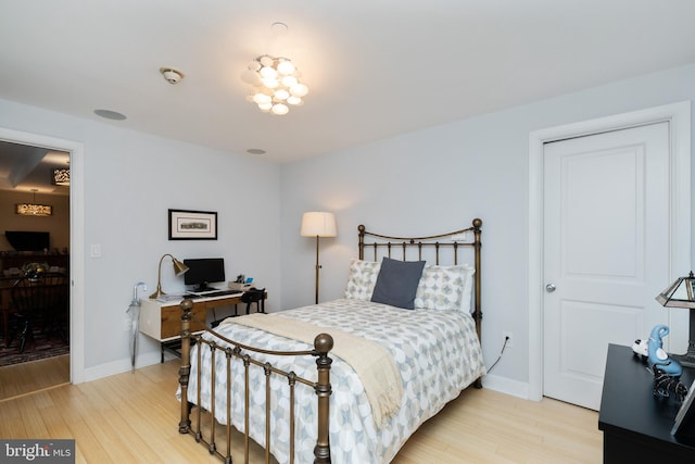 bedroom with light wood-type flooring