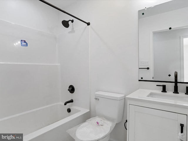 full bathroom with vanity,  shower combination, and toilet