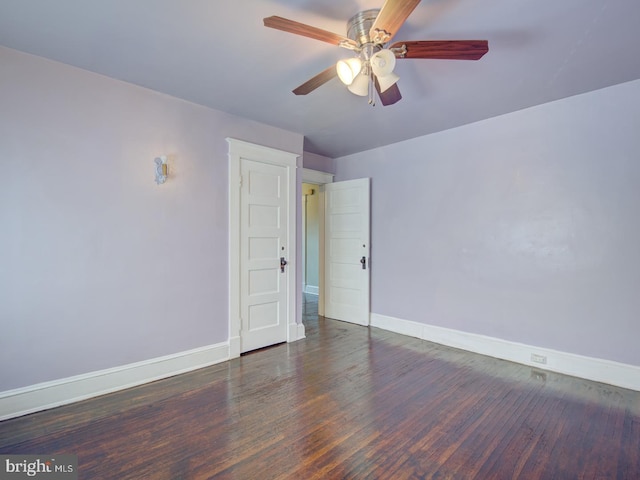 unfurnished room featuring ceiling fan and dark hardwood / wood-style floors