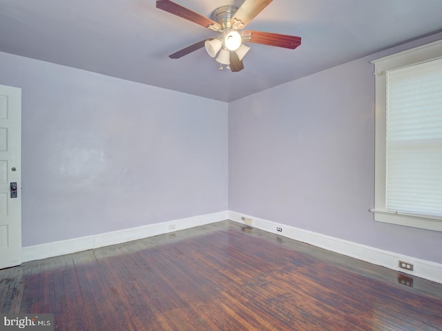 unfurnished room featuring ceiling fan and dark hardwood / wood-style floors