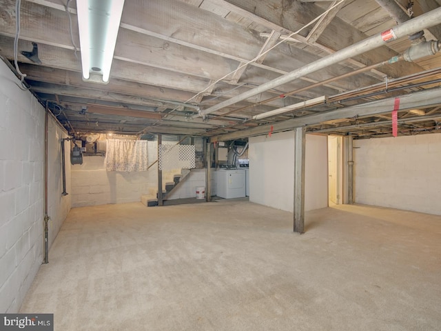 basement featuring washing machine and dryer