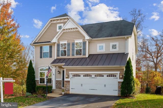 craftsman-style house featuring a garage