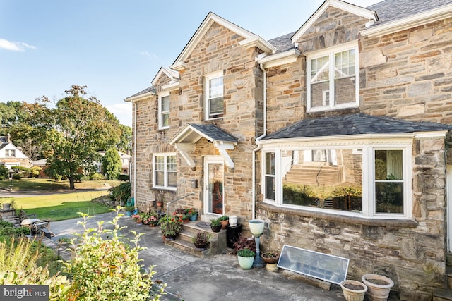 view of front of property with a patio area