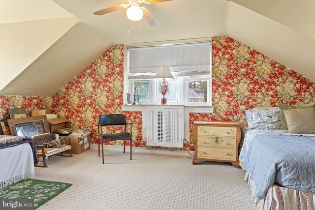 carpeted bedroom with lofted ceiling and ceiling fan