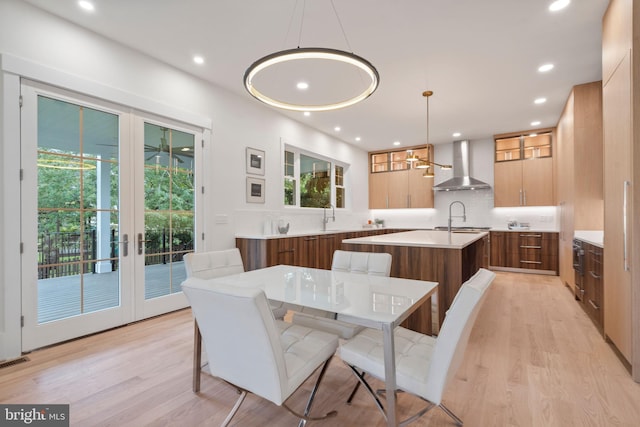 dining room featuring visible vents, recessed lighting, french doors, and light wood-style floors