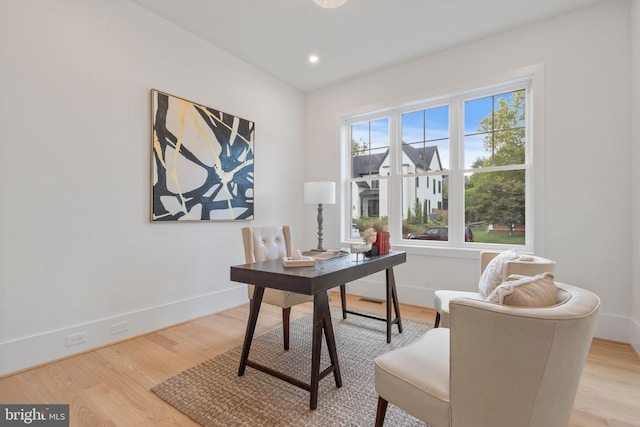 office with recessed lighting, baseboards, and light wood-style floors