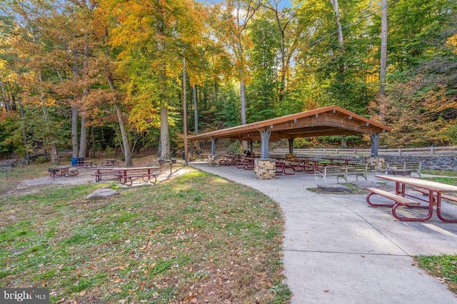 view of home's community featuring a gazebo, a yard, and a patio area