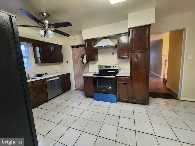 kitchen featuring wall chimney exhaust hood, stainless steel appliances, dark brown cabinets, and ceiling fan