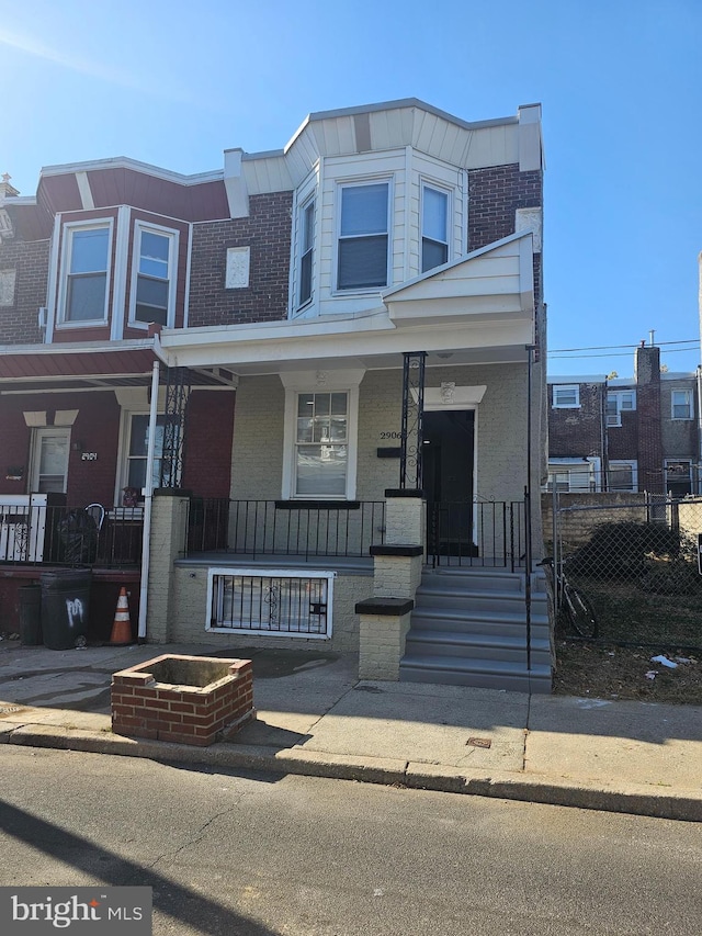 multi unit property featuring covered porch