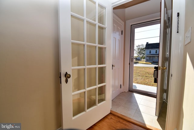 doorway to outside featuring light hardwood / wood-style floors