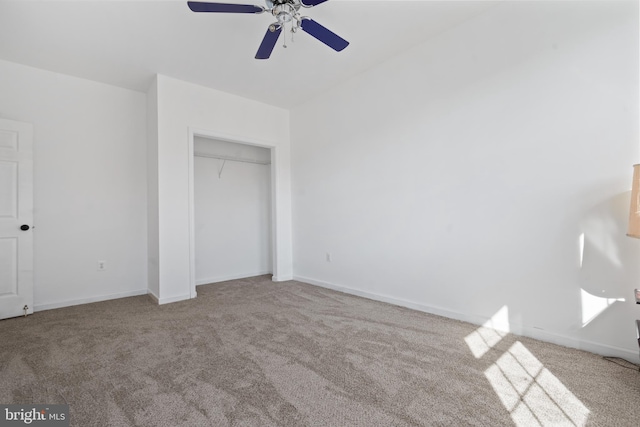 unfurnished bedroom featuring carpet flooring and ceiling fan