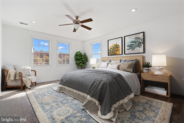 carpeted bedroom featuring ceiling fan