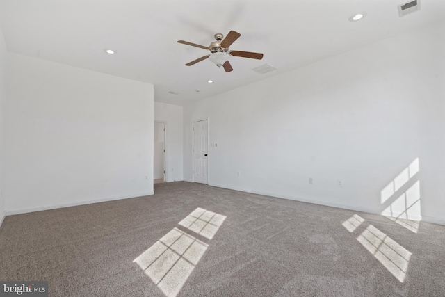 carpeted empty room with ceiling fan