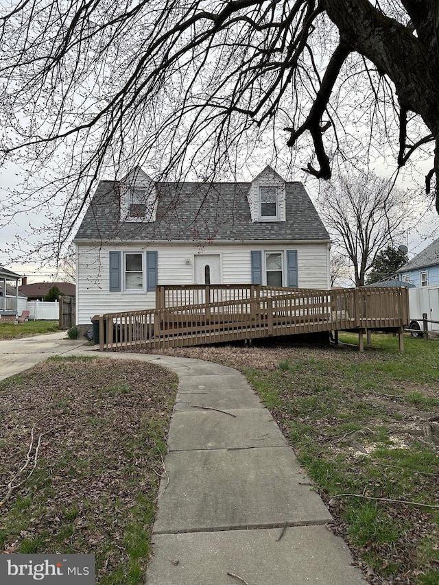 view of front of home with a wooden deck