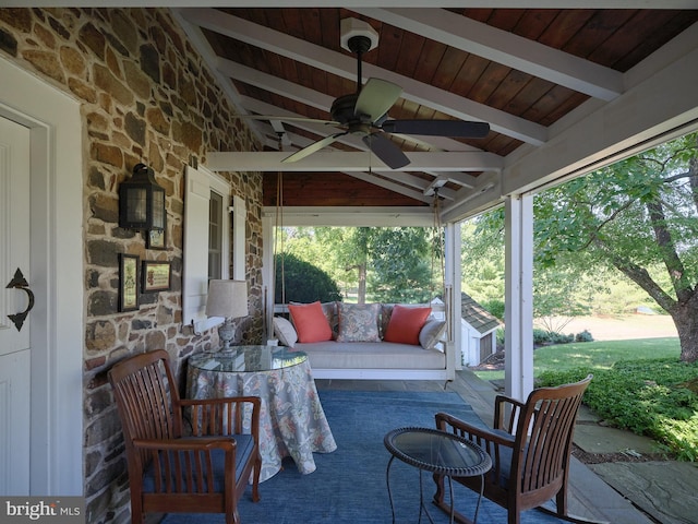 view of patio / terrace with ceiling fan and an outdoor hangout area