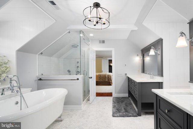 bathroom with vanity, wooden walls, independent shower and bath, and an inviting chandelier