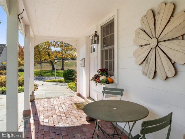 view of patio featuring a porch