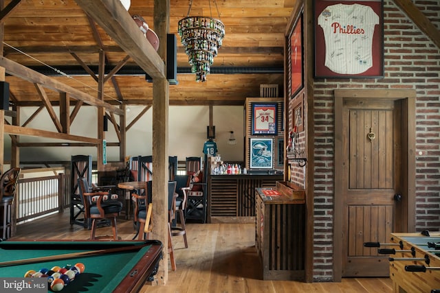 playroom with a chandelier, hardwood / wood-style floors, billiards, and wood ceiling